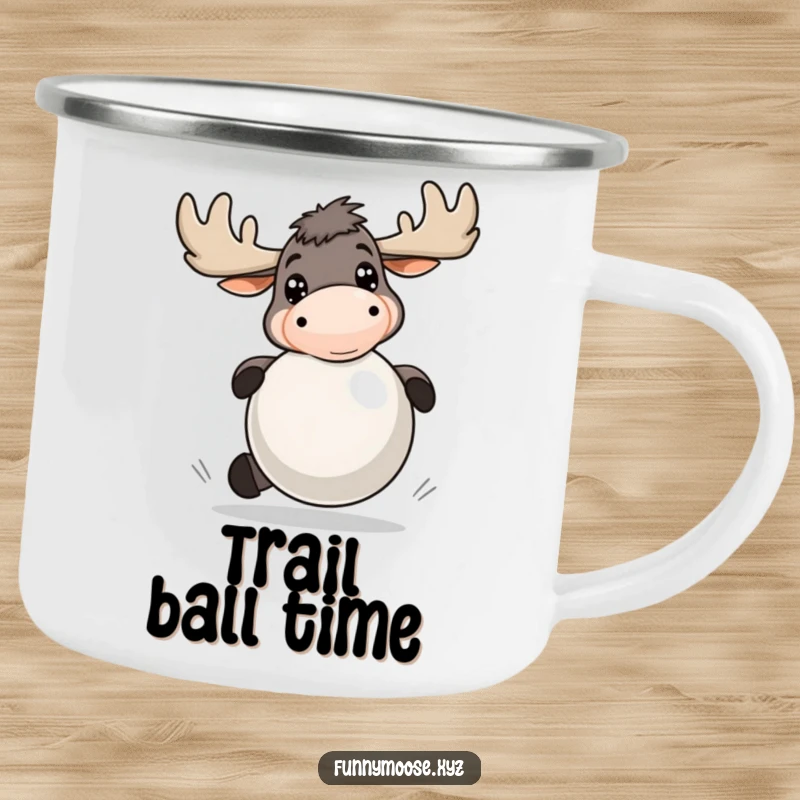Funny camping mug featuring an energetic moose with bright eyes, playfully bouncing a large ball, for outdoor excursions.