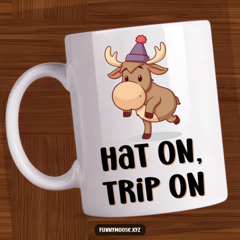 Funny mug showing a silly moose in a small hat comically tripping over its own large feet.