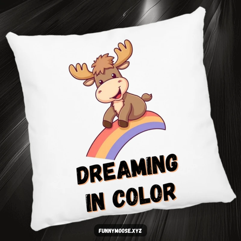 Funny pillow featuring a happy moose sliding down a rainbow, offering comfort and a touch of playful decor.