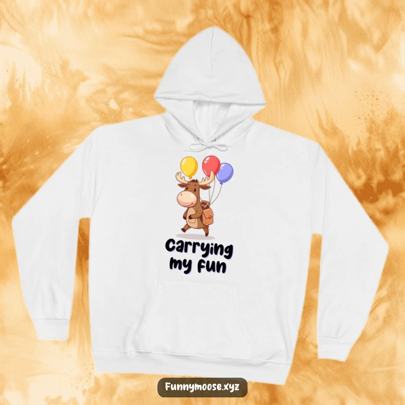Funny moose hoodie with a small backpack juggling colorful balloons, ideal for cozy and whimsical gift seekers.